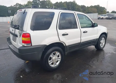 2003 Ford Escape Xlt z USA, uszkodzony, nr VIN 1FMYU03193KA72637